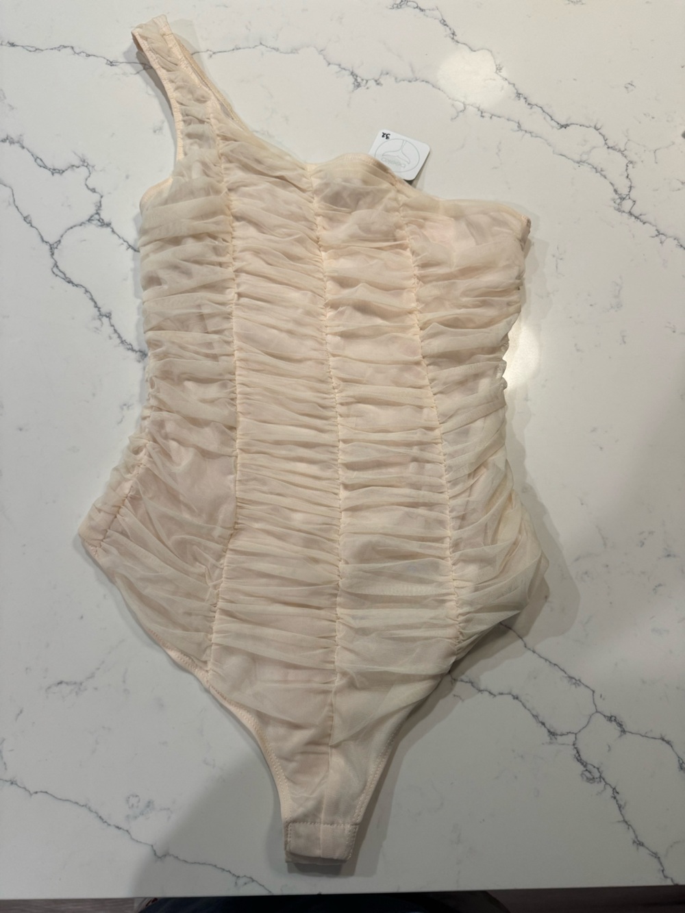 One-Shoulder Ruched Bodysuit in Nude
